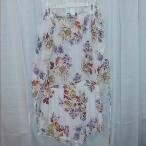 Floral white romper and off the shoulder.